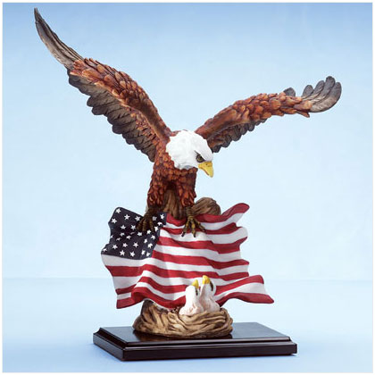 Eagle with chicks in nest and the US flag